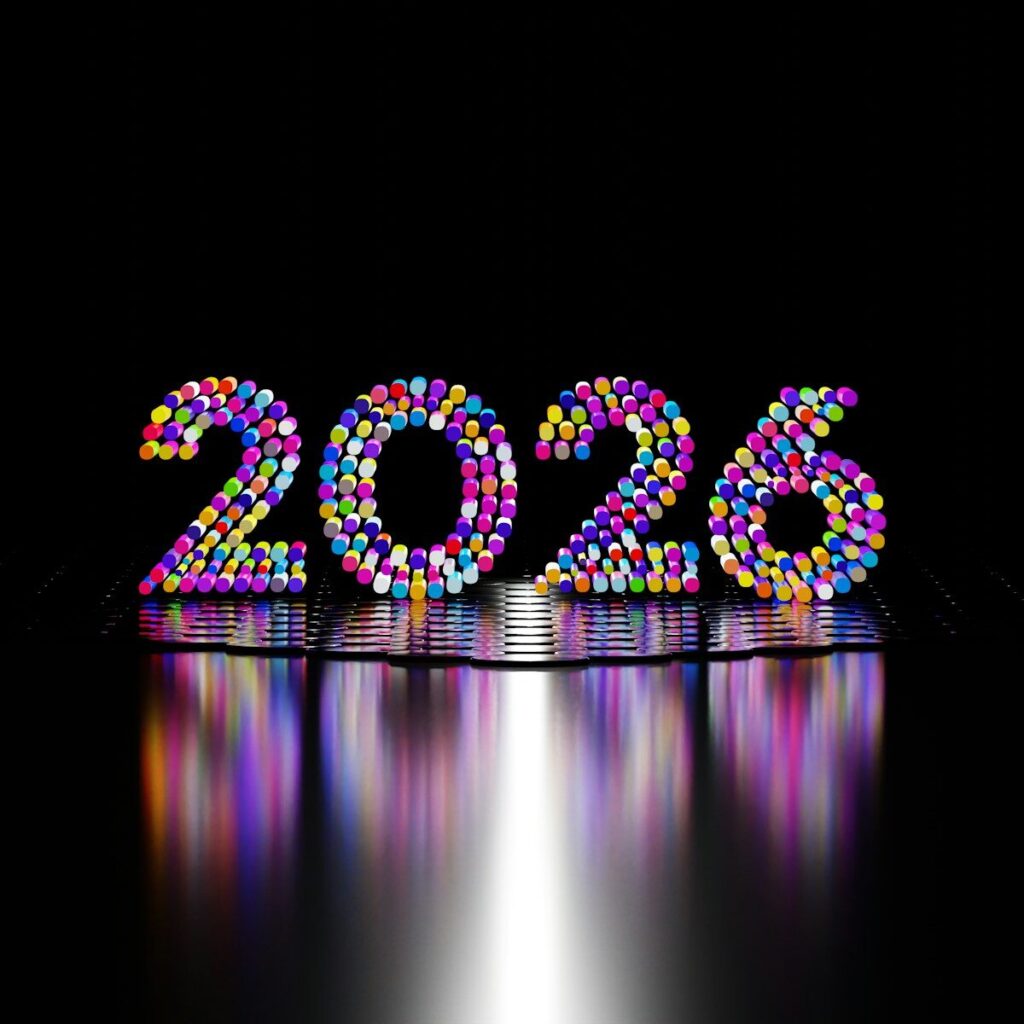 Colorful 2026 numbers on a reflective surface